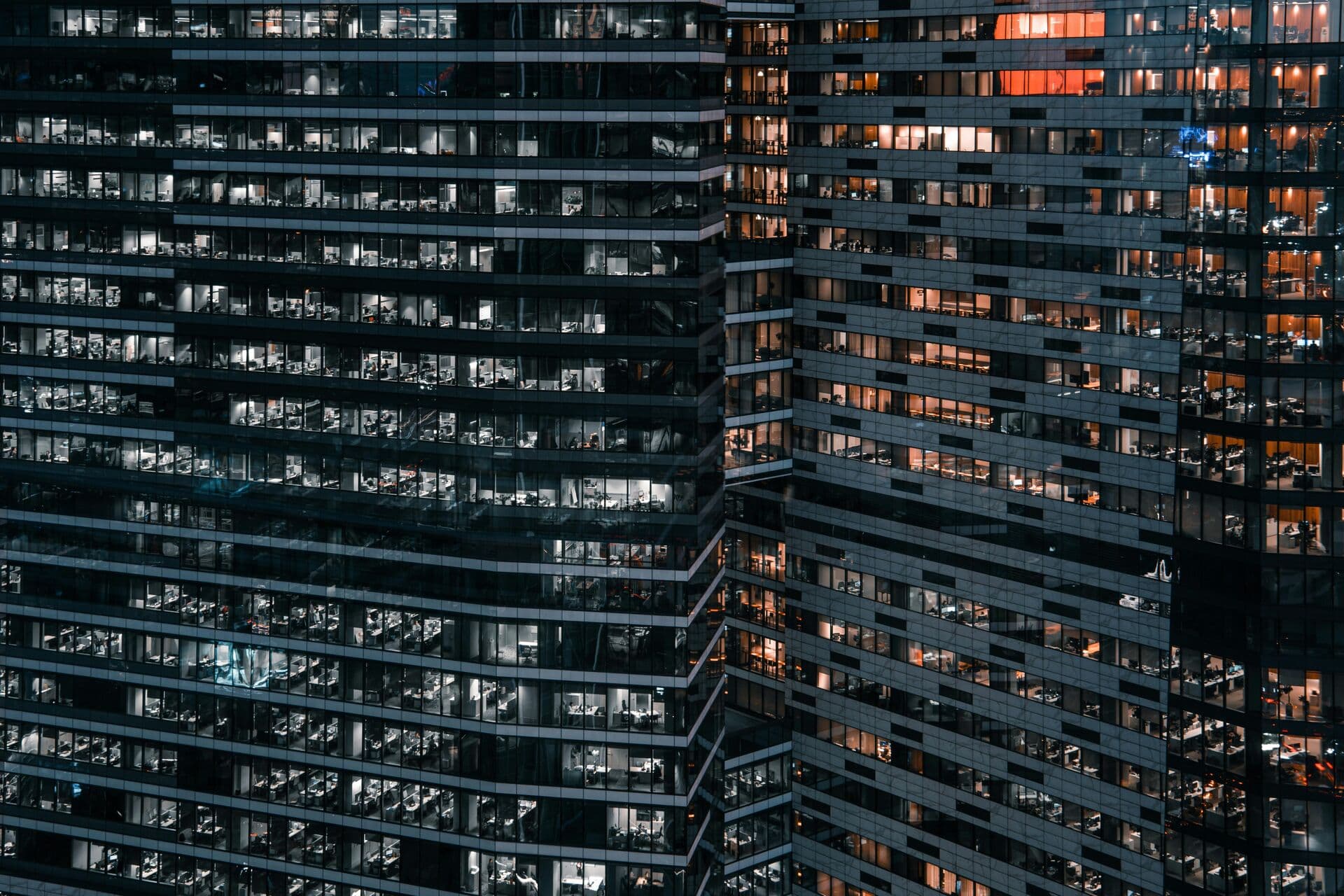 Office floors lit through the evening